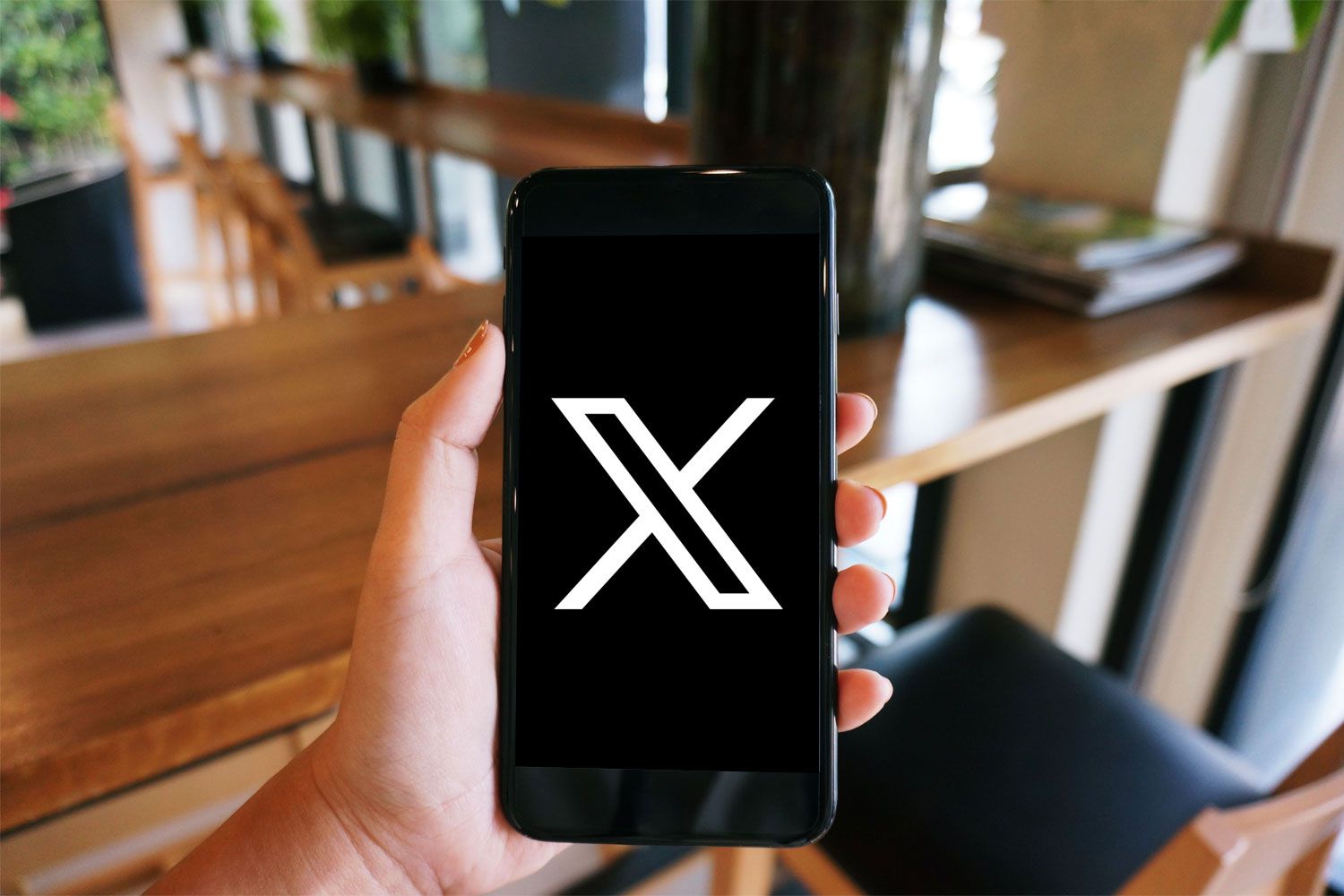 X Logo on Phone